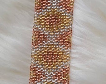 Copper, gold, and silver ombre diamond bracelet