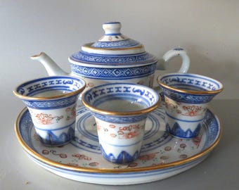 Juego de té de porcelana china vintage con granos de arroz, tetera, 3 tazas y bandeja. Artículo de colección.