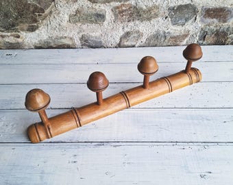 Vintage French Wooden Coat Rack: 4 Hooks, Faux Bamboo, Wall Decoration from France - handpicked by me