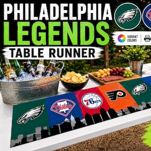 May include: A colorful table runner featuring logos of Philadelphia sports teams: Eagles, Phillies, 76ers, and Flyers. The runner has a cityscape silhouette at the bottom and the text "PHILADELPHIA LEGENDS TABLE RUNNER".