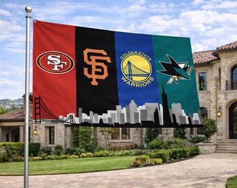 May include: A rectangular flag featuring four vertical panels with team logos: 49ers, Giants, Warriors, and Sharks. The flag includes a cityscape silhouette at the bottom and is displayed outdoors on a pole.