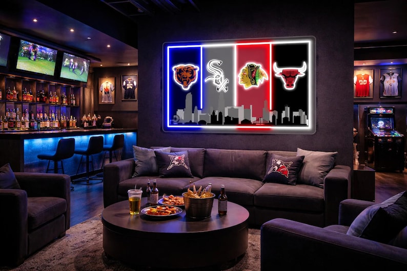 May include: A rectangular wall sign featuring four vertical panels in blue, gray, red, and black, each displaying a Chicago sports team logo above a silhouette of the city skyline. The sign is illuminated with bright neon-style lighting.