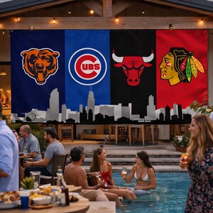 May include: Four large banners displaying Chicago sports team logos: Bears, Cubs, Bulls, and Blackhawks. A Chicago skyline silhouette is at the base of the banners. People are socialising around a pool and tables, with drinks and food.