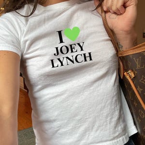 i <3 joey lynch – cotton baby tee – green heart