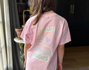 Kinder Buch Liebhaber Shirt, Peace Love Bücher T-Shirt, Pastell Lese Shirt, Jugend Grafik T-Shirt, süßes Buch Shirt für Kinder, Bibliothek Tag T-Shirt