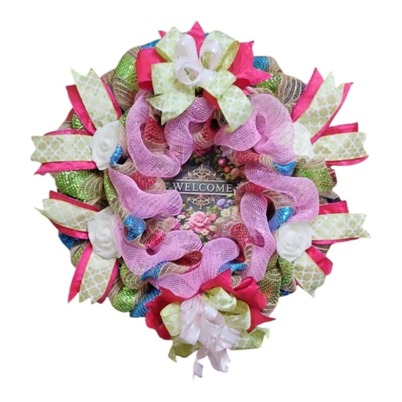 Lovely welcome wreath in bright, fresh spring colors of pink, green, and blue!