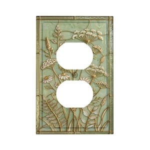 May include: A set of three ceramic mugs with a speckled, matte finish. The mugs are in shades of cream, light gray, and dark gray. Each mug has a simple, minimalist design and a rounded handle. Perfect for coffee or tea.