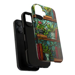 May include: Black phone case with a colorful design of a bookshelf with plants and books. The case is made of durable material and provides protection for the phone. The design features a stained glass effect.