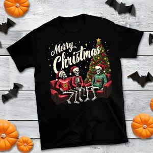Frohe Weihnachten Skelette tragen hässliche Weihnachtsstrickjacken Unisex klassisches T-Shirt