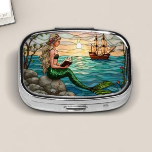 Blonde Mermaid Reading Pill Box – Stained Glass Style Ocean Sunset Design – Fantasy Travel Case for Book Lovers and Sea Dreamers