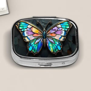 Stained Glass Style Butterfly Pill Box – Iridescent  Design on Black Background – Small Travel Pill Case  – Rainbow Insect Pocket Organizer