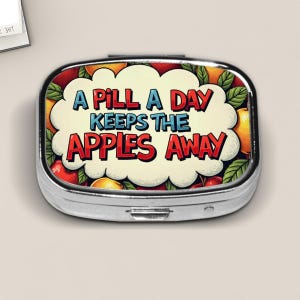 Funny Pill Box – “A Pill a Day Keeps the Apples Away” Comic Style Medicine Case, Humorous Travel Pill Holder, Quirky Gift