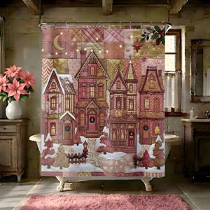 May include: A shower curtain featuring a patchwork-style winter village scene in shades of pink, gold, and cream. The design includes multi-storey houses, snow-covered ground, evergreen trees, a crescent moon, and festive wreaths on the doors.