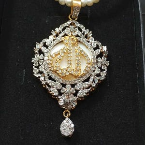 zircon Allah name pendant with mother of pearl