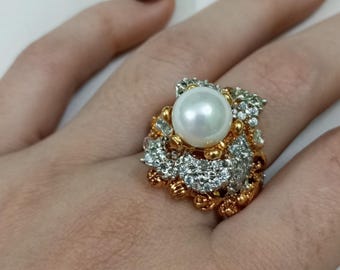 Blommig pärlemorring