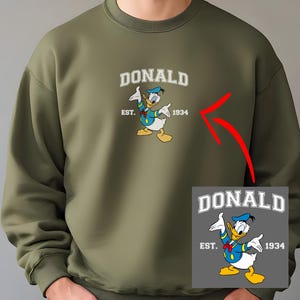 Donald Duck Est. 1934 Hoodie, Disney Embroidered Sweatshirt, Digitized Donald Duck Gift,Disney Family Vacation Outfit,Donald Embroidery Crew