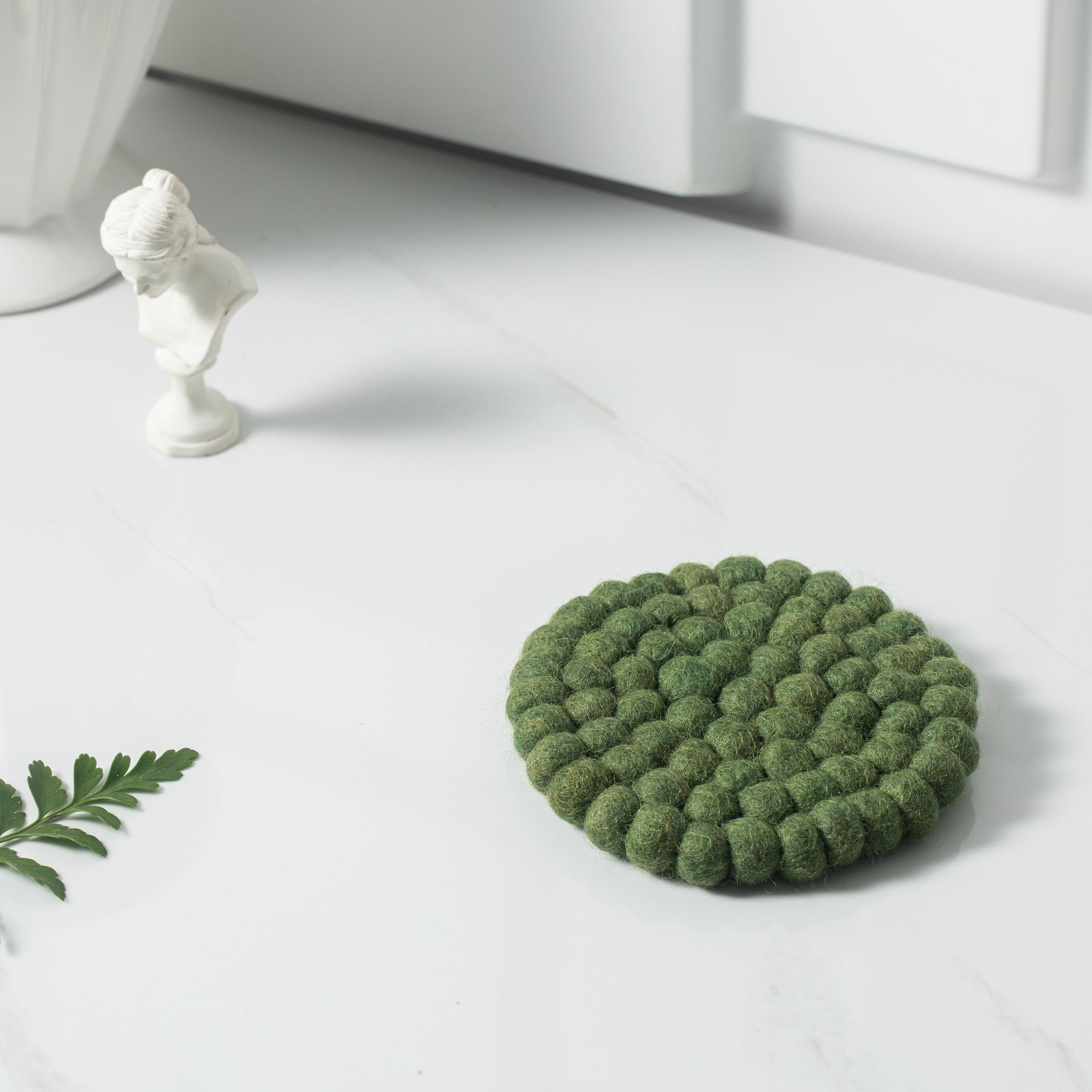 Onderzetters set van 4 van vilt met rendiermotief, - Kerst shop
