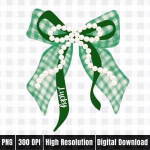 May include: A green and white gingham bow with a dark green center and streamers. The bow is adorned with a string of white pearls. The word "Lucky" is written on one of the streamers.