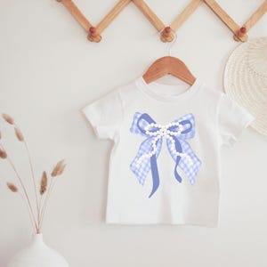 Blue Ribbon Bow PNG First Birthday Bow Design Baby Girl Gingham Bow PNG Nursery Wall Art Blue Bow for Scrapbook Gingham Pearl Bow Shirt