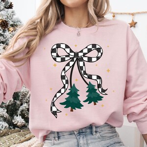 Winter Mama Coquette Festive Design Cozy Season PNG on pink sweatshirt