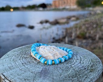 pulseira de contas de argila marinha dourada