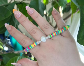 pulseira de contas de argila shellabration