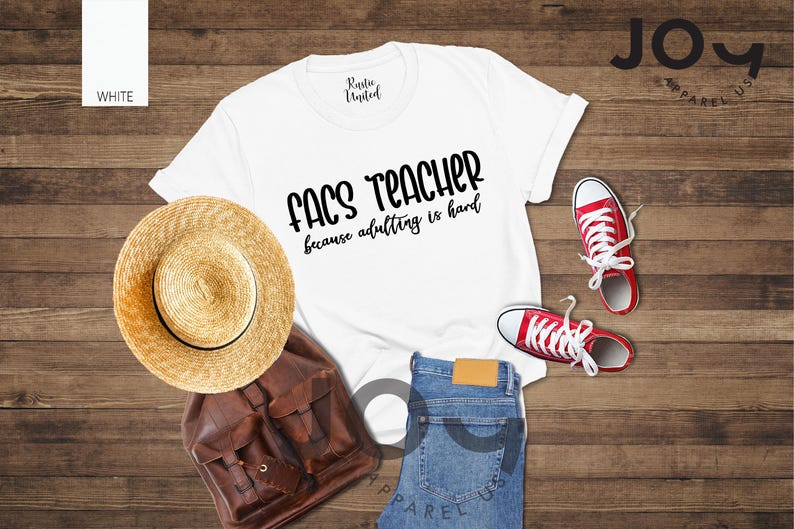 May include: A white t-shirt with the text "FACS TEACHER because adulting is hard" is displayed with a straw hat, brown backpack, blue jeans, and red sneakers. The items are arranged on a wooden surface.