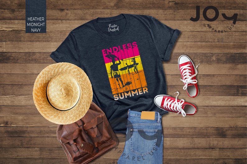 May include: A navy blue t-shirt with the words "ENDLESS SUMMER" and a graphic of surfers. The image also includes a straw hat, a brown backpack, blue jeans, and red sneakers.
