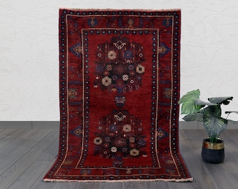 Handmade Wool Tribal Rug: Vibrant Red & Blue Floral Carpet (4.8 x 3.0 ft.)