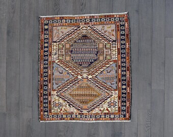 Vintage Caucasian Kuba Rug: Wool Medallion, Animal Motifs