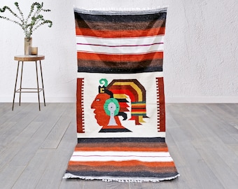 Vintage Wool Rug | Handwoven Flatweave with Aztec-Inspired Face Motif, Red & Earth Tones