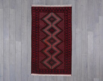 Handwoven Nomadic Rug with Bold Geometric Patterns