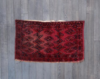 Antique Turkoman Wool Rug – Handwoven Red and Black Geometric Design