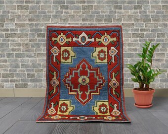 Handwoven Geometric Wool Rug: Red, Blue, Yellow Accent - 0.75 x 0.56 meters