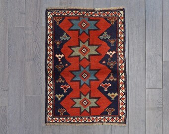 Handwoven Wool Star Rug – Vibrant Red, Navy & Green Carpet