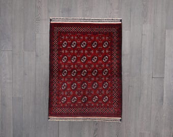 Vintage Turkmen Rug: Hand-Knotted Wool Bokhara Rug, Madder Red, 4x2 ft