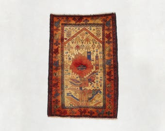 Vintage Baluch Rug 129x89 cm | Hand-Knotted Wool Rug | Tribal Mihrab Design with Tree of Life & Red Sun Medallion | Natural Dyes