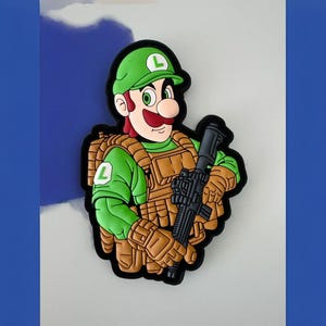 May include: A green and brown cartoon character wearing a green hat with an 'L' on it, holding a black rifle. The character is wearing a green shirt and brown tactical gear.