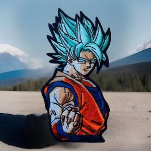 May include: An embroidered patch featuring a blue-haired anime character with a determined expression. The character is wearing an orange and blue outfit and is posed with a clenched fist.