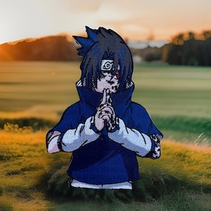 May include: Embroidered patch featuring a blue-clad anime character with black hair, red eyes, and a white headband with a spiral symbol. The character is in a meditative pose with hands clasped in front of their chest.
