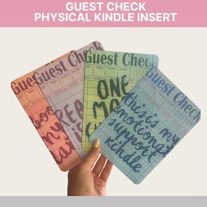 May include: Four colorful guest check inserts with handwritten text. The inserts are in shades of orange, green, and blue. Text includes "Guest Check", "One More", and "This is my emotional support kindle."