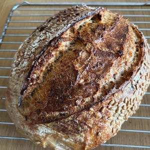 Sourdough bread, freshly homemade sourdough loaf, artisan sourdough bread, traditional sourdough bread, long fermented sourdough loaf