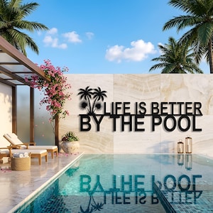 May include: A black metal sign reading "LIFE IS BETTER BY THE POOL" is displayed on a stone wall. The image features a swimming pool, palm trees, and a blue sky, creating a relaxing outdoor scene.