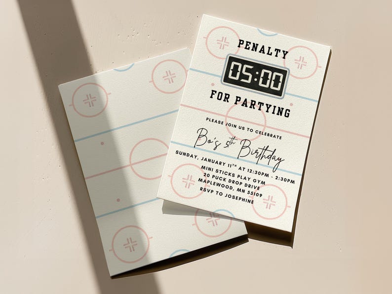 May include: Hockey-themed birthday party invitations. The design features a hockey rink graphic with pink and blue lines and circles. The invitation text includes "PENALTY 05:00 FOR PARTYING" and details for the party, including the birthday boy's name and age.
