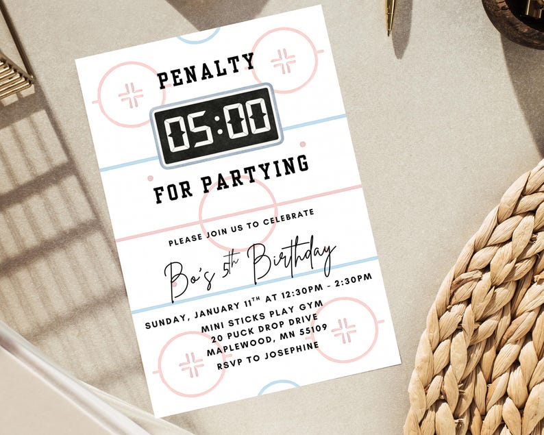 May include: A white invitation card with a hockey theme. The card features a hockey rink design with pink and blue accents. Text includes "PENALTY", "05:00", "FOR PARTYING", and "Ba's 5th Birthday". Party details are also included.