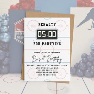 May include: A birthday party invitation with a hockey theme, featuring the text "PENALTY 05:00 FOR PARTYING". The invitation includes details for Bo's 5th birthday, with a hockey rink design and a brown envelope.