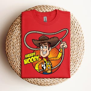 May include: A rustic wooden sign with the text "Welcome to our home" in white lettering. The sign features a distressed finish and a simple, inviting design, perfect for entryway decor.