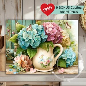 May include: A floral still life featuring a cream-colored pitcher filled with blue, pink, and white hydrangeas. Butterflies flutter among the blooms. The artwork is set against a weathered wooden background. The image includes the text "FREE!" and "9 BONUS Cutting Board PNGs".
