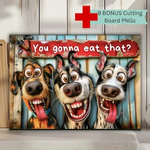 May include: A comical wall art print depicting three cartoon dogs with large, expressive faces. The dogs are grinning with their tongues out, and the print includes the text "You gonna eat that?" and "9 BONUS Cutting Board PNGs".