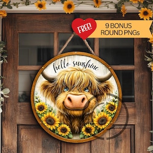May include: Circular wooden sign with a Highland cow illustration, sunflowers, and the text "hello sunshine". A red heart-shaped tag with "FREE!" hangs above, and a banner says "9 BONUS ROUND PNGS". The sign is hanging on a wooden door.
